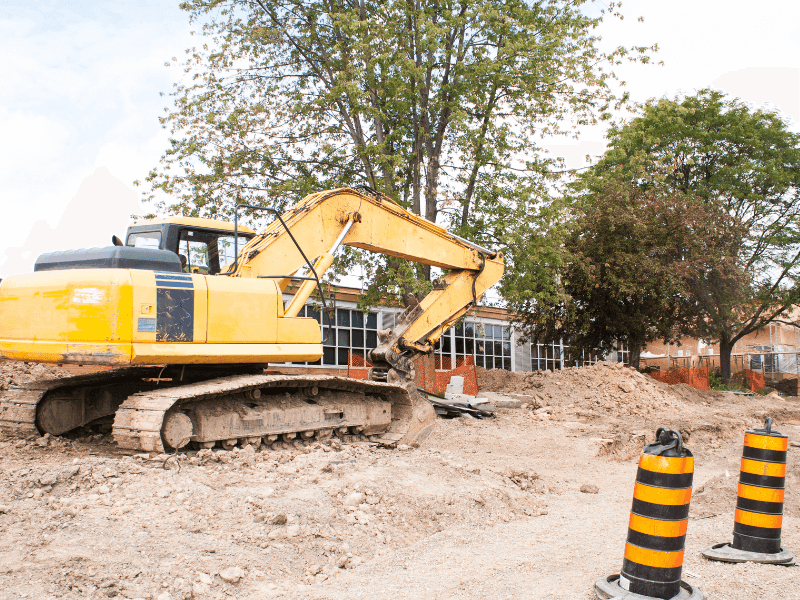 una-excavadora-removiendo-la-tierra-como-hacer-un-presupuesto-de-obra-como-hacer-un=presupuesto-de-obra