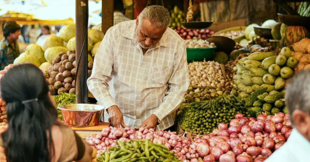 un-colamdero-vendiendo-fruta-en-su-negocio-ilustrando-que-tipo-de-RNC-necesita-un-negocio-pequeño